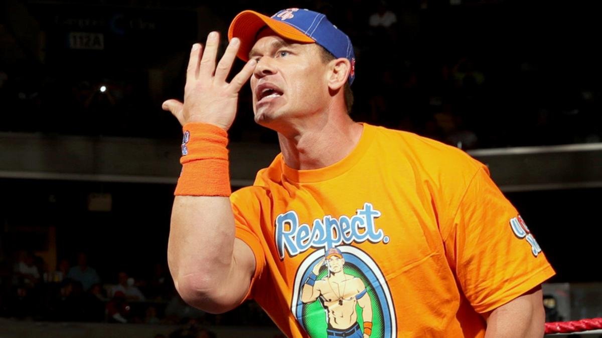 John Cena performing his You Can't See Me hand gesture