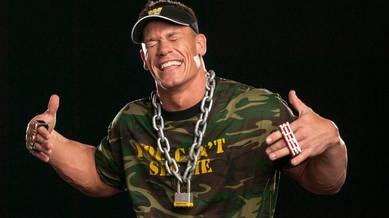 John Cena wearing a camouflage You Can't See Me shirt