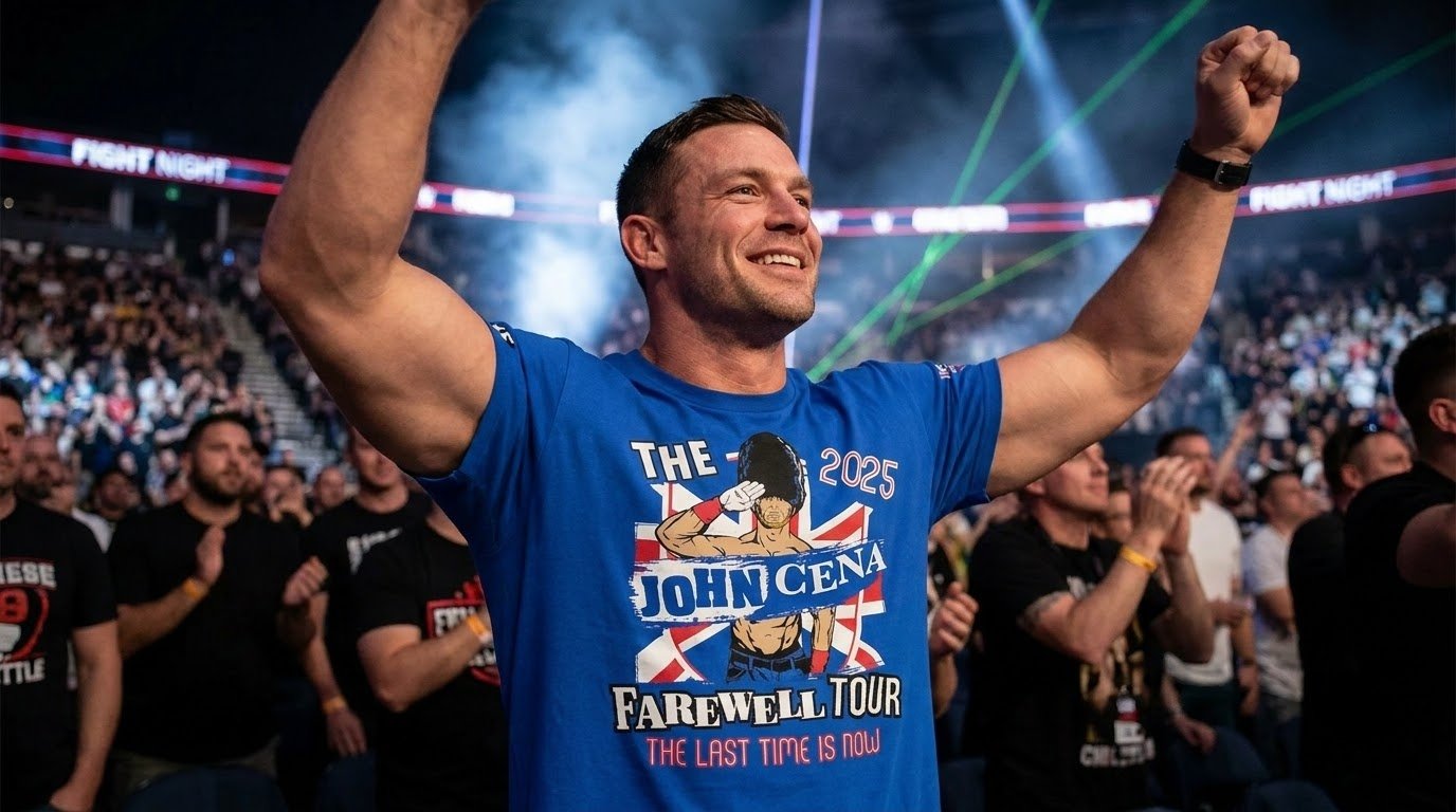 John Cena London shirt worn while cheering at a sports arena.